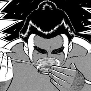 力水を厳粛に押し頂く金竜山